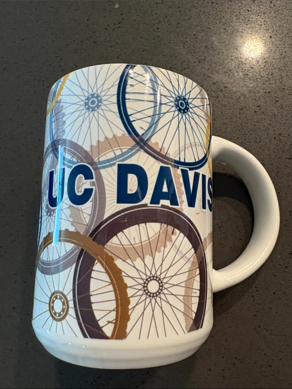 UC Davis Bicycle Wheel Ceramic Coffee Mug - Blue & Brown